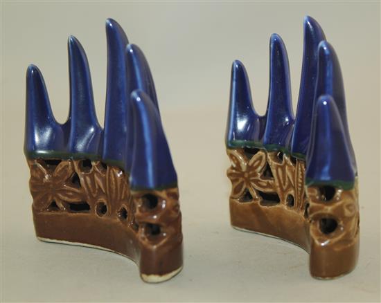 A pair of Chinese blue and cafe au lait glazed mountain peak brush rests, 18th century, height 9cm